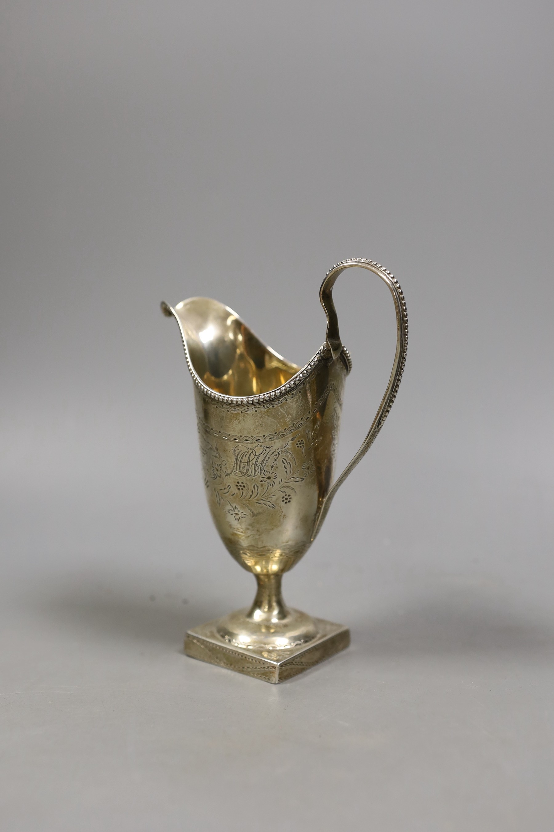 A George III silver cream jug, John Lambe, London, 1781, 16.2cm, `27 grams.